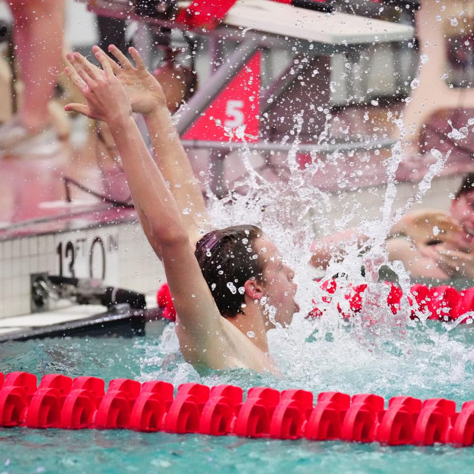 Muskego's Carter Jewell celebrates winning the 500-yard freestyle during the WIAA Division 1 boys state swimming and diving championships at Waukesha South, Saturday, Feb. 17, 2024.