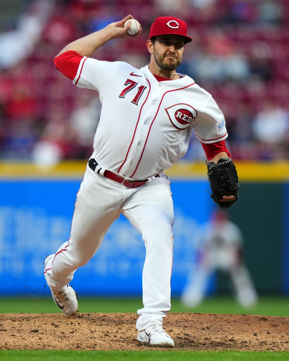 Cincinnati Reds starting pitcher Connor Overton (71) delivers in the fourth inning of a baseball game between the Chicago Cubs and the Cincinnati Reds, Monday, April 3, 2023, at Great American Ball Park in Cincinnati. The Cincinnati Reds won, 7-6.