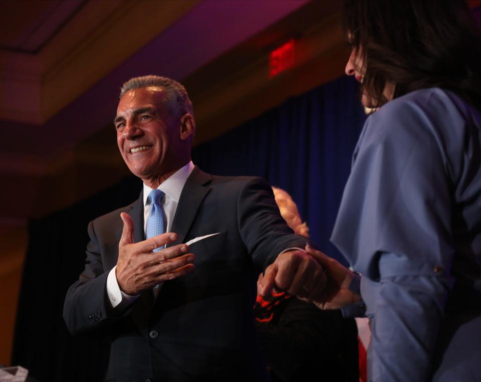 Jack Ciattarelli with his wife Melinda comes out to address his supporters at 12:30am at the Marriott in Bridgewater, NJ on November 3, 2021. The supporters of the New Jersey gubernatorial candidate were told to wait for all the votes to be counted as Ciattarelli tries unseat incumbent governor Phil Murphy in a tight race that was too close to call.