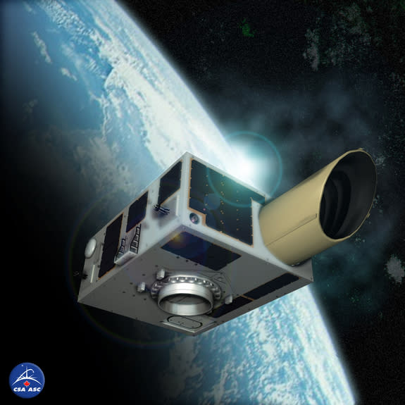 An artist's illustration of the NEOSSat asteroid-hunting satellite in Earth orbit. The Canadian Space Agency mission will search for large asteroids near Earth and track space debris.