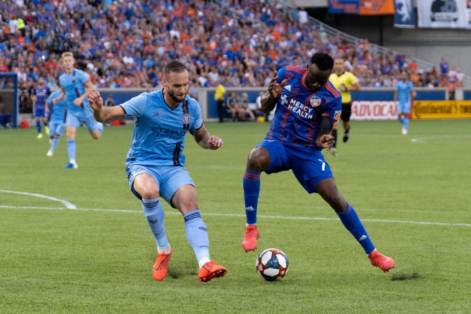 Roland Lamah (7) takes on a defender during FC Cincinnati's MLS game against NYCFC at Nippert Stadium in Cincinnati, Ohio on Saturday, August 17, 2019.