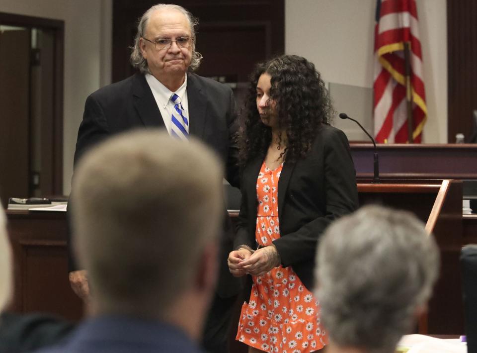 Micayla Yusko walks back to the defense table with her attorney, Jeffrey Deen, after reading a statement, Thursday, May 2, 2024, during sentencing in Circuit Judge Karen Foxman's courtroom at the S. James Foxman Justice Center for her part in the January 2022 murder of 89-year-old Margaret Hindsley in Ponce inlet.