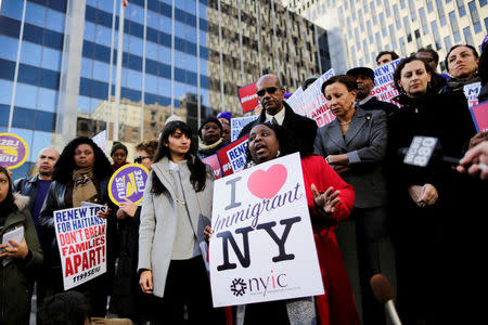 Haitian immigrants and supporters rally to reject DHS Decision to terminate TPS for Haitians, at the Manhattan borough in New York, U.S., November 21, 2017. REUTERS/Eduardo Munoz