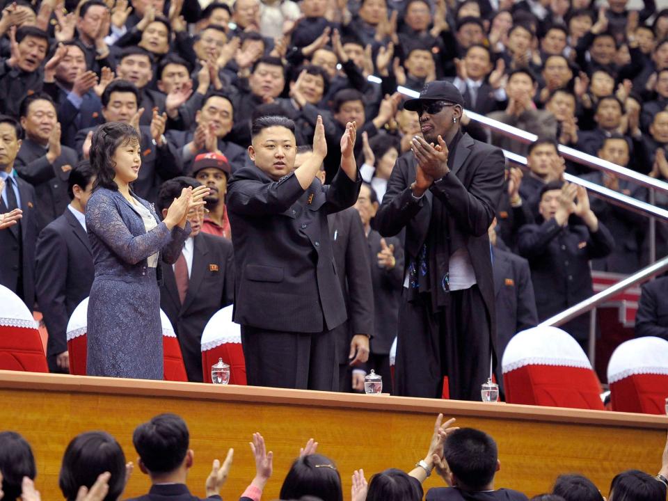 Dennis Rodman (right) and Kim Jong-un attend a basketball game in Pyongyang.