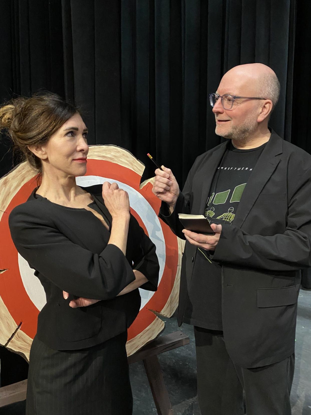 Tina Davis is Carmen Bernstein, the brassy show producer, and Brad Kisner is Lt. Frank Cioffi, the star-struck investigating officer from the Boston Police Department, in Hudson Players production of "Curtains."