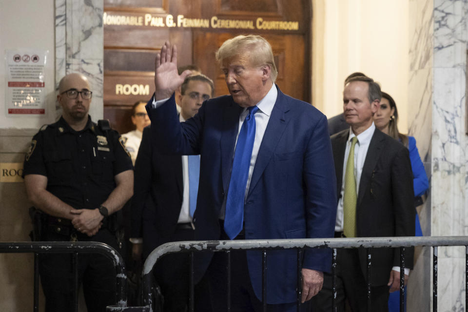 Former President Donald Trump exits courtroom in his civil business fraud trial at New York Supreme Court, Wednesday, Oct. 25, 2023, in New York. (AP Photo/Yuki Iwamura)