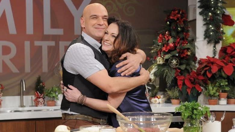 Michael Symon and wife hugging