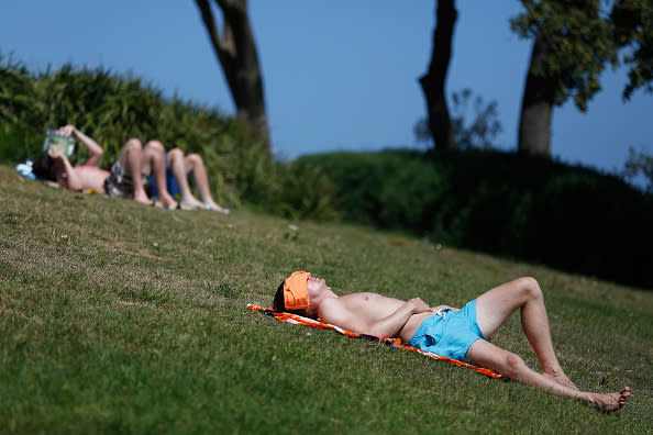 Beachgoers enjoy the hot weather at Coogee Beach.