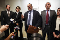 Manhattan District Attorney Alvin Bragg, center, surrounded by his legal team, speaks to the media after the jury found the Trump Organization guilty on all counts in a criminal tax fraud case, Tuesday, Dec. 6, 2022, in New York. (AP Photo/Julia Nikhinson)