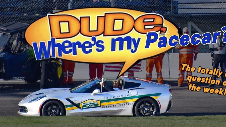 a race car with a banner over it