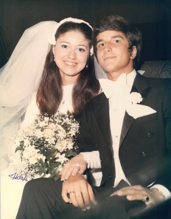 "My parents Aleida and Vicente de la Vega were high school sweethearts. They had been 'going steady' for four years before they married in December 1971 in Miami, Florida. On a whim, my mother attended a bridal fair with some friends and entered in a raffle to win an all-inclusive honeymoon to a fancy resort in Acapulco, Mexico. Well, she won the raffle&nbsp;but was told that the prize expired in five months. Soon after, the happy couple was engaged, married and on their way to Mexico. I am happy to report they are still happily married." -- <i>Mauricio de la Vega</i>