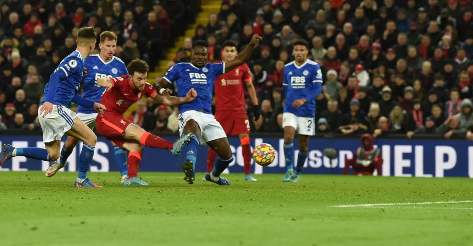 LIVERPOOL, ENGLAND - FEBRUARY 10: (THE SUN OUT,THE SUN ON SUNDAY OUT ) Diogo Jota of Liverpool scores the second goal making the score 2-0 during the Premier League match between Liverpool and Leicester City at Anfield on February 10, 2022 in Liverpool, England. (Photo by John Powell/Liverpool FC via Getty Images)