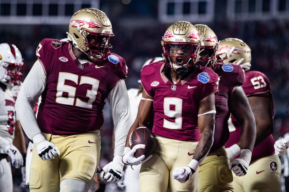 Florida State Seminoles running back Lawrance Toafili (9) celebrates his touchdown. The Florida State Seminoles defeated the Louisville Cardinals 16-6 to claim the ACC Championship title in Charlotte, North Carolina on Saturday, Dec. 2, 2023.