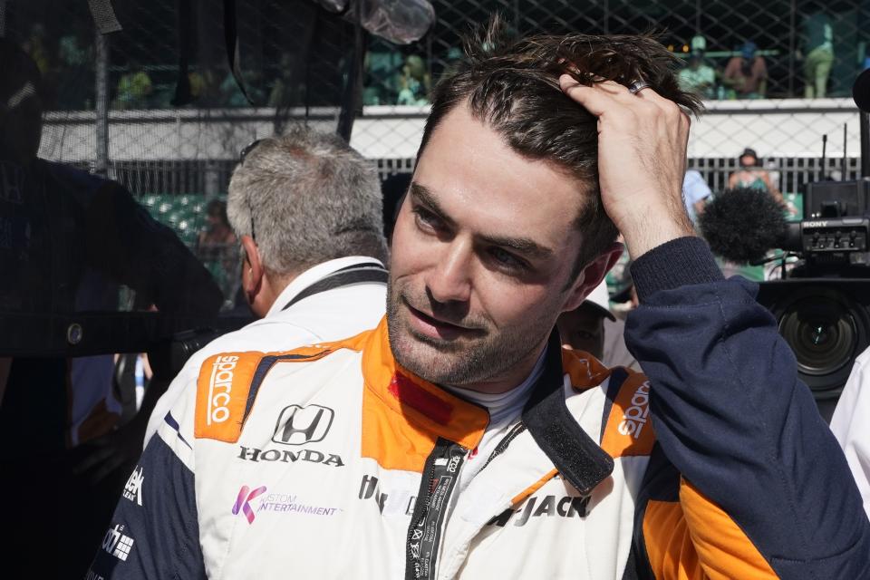 Jack Harvey, of England, reacts after qualifying for the Indianapolis 500 auto race at Indianapolis Motor Speedway, Sunday, May 21, 2023, in Indianapolis. (AP Photo/Darron Cummings)