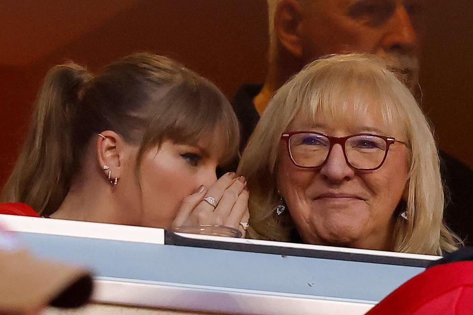 <p>Jamie Squire/Getty </p> Taylor Swift (left) and Donna Kelce at the Kansas City Chiefs game on Oct. 12.