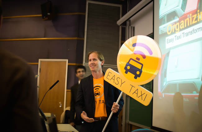 Blake Larson and Easy Taxi at HKU. Image Credit: HKU