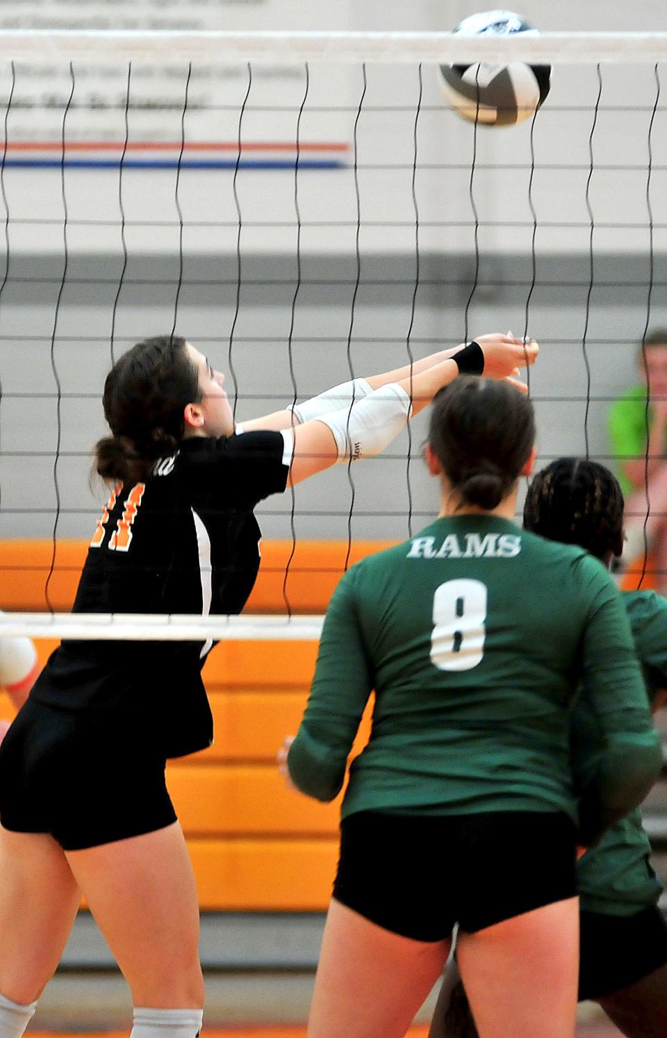 Ashland High School’s Jenna Hartson (11) makes a pass during volleyball action against Madison.
