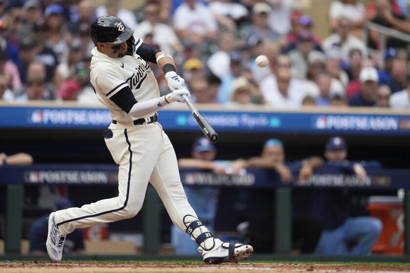 Twins' Royce Lewis connects for a solo home run in Game 1 of an AL wild-card playoff series against the Blue Jays