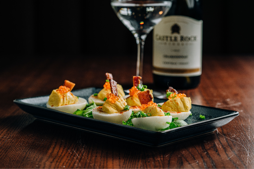 Link and Pin’s “Granddad’s Deviled Eggs” are topped with trout roe and candied jalapeno bacon.