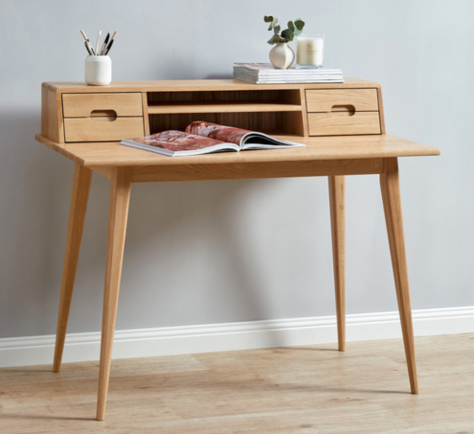 Scandi-style desk from Temple & Webster with storage built into the monitor stand