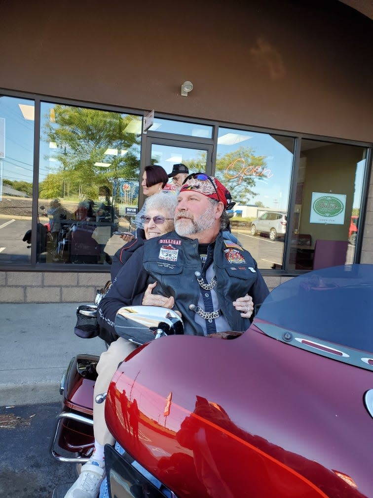 Betty Hammond of Salem recently celebrated her 90th birthday with a motorcycle ride and lunch at Brighton Hot Dog Shoppe in Salem. Mike Blythe, seen here on a motorcycle with Hammond, was Hammond's driver for the trip around town.