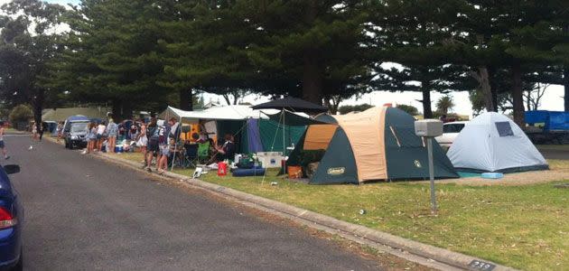 Some schoolies have already set up tents as they set themselves up for a big weekend of celebrations. Photo: Roscoe Whalan, 7News.