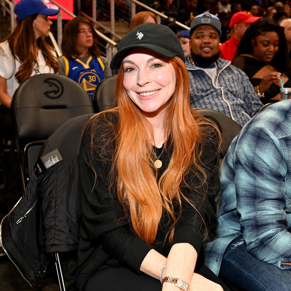 ATLANTA, GEORGIA - FEBRUARY 03: Actress Lindsay Lohan attends the game between Golden State Warriors and the Atlanta Hawks at State Farm Arena on February 03, 2024 in Atlanta, Georgia. NOTE TO USER: User expressly acknowledges and agrees that, by downloading and or using this photograph, User is consenting to the terms and conditions of the Getty Images License Agreement. (Photo by Paras Griffin/Getty Images)