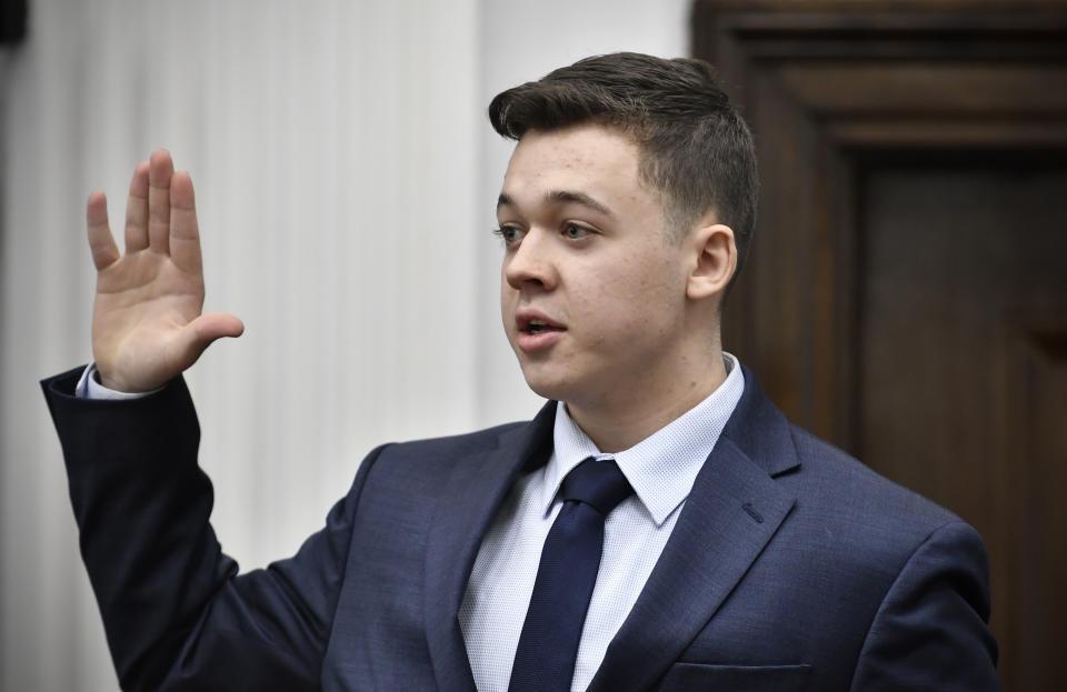 Kyle Rittenhouse is sworn in before testifying in his trial at the Kenosha County Courthouse in Kenosha, Wis., on Wednesday, Nov. 10, 2021. Rittenhouse is accused of killing two people and wounding a third during a protest over police brutality in Kenosha, last year. (Sean Krajacic/The Kenosha News via AP, Pool)