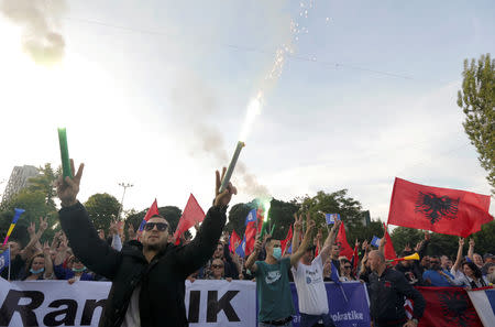 Supporters of the opposition party attend an anti-government protest in front of Prime Minister Edi Rama's office in Tirana, Albania, May 25, 2019. REUTERS/Florion Goga