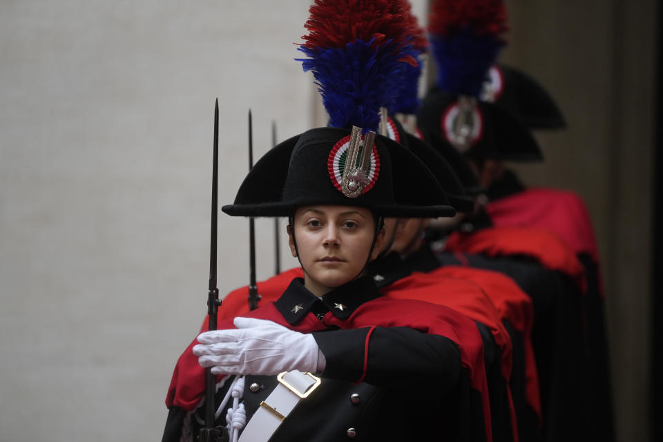 Carabinieri policewomen, part of the Chigi Palace governmen offices honor guard, wait for the arrival of The Netherland's Premier Mark Rutte meeting Italian Premier Giorgia Meloni on Women's Day in Rome, Wednesday, March 8, 2023. (AP Photo/Gregorio Borgia)
