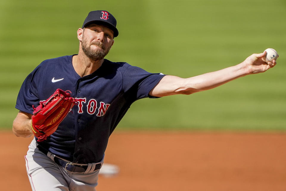 FILE -Boston Red Sox starting pitcher Chris Sale pitches during the first inning of a baseball game against the Washington Nationals at Nationals Park, Thursday, Aug. 17, 2023, in Washington. Chris Sale's injury-filled career with the Boston Red Sox ended Saturday, Dec. 30, 2023 when the 34-year-old left-hander was traded the Atlanta Braves for infielder Vaughn Grissom. (AP Photo/Andrew Harnik, File)