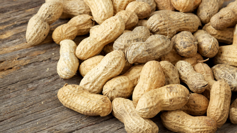 pile of unshelled peanuts
