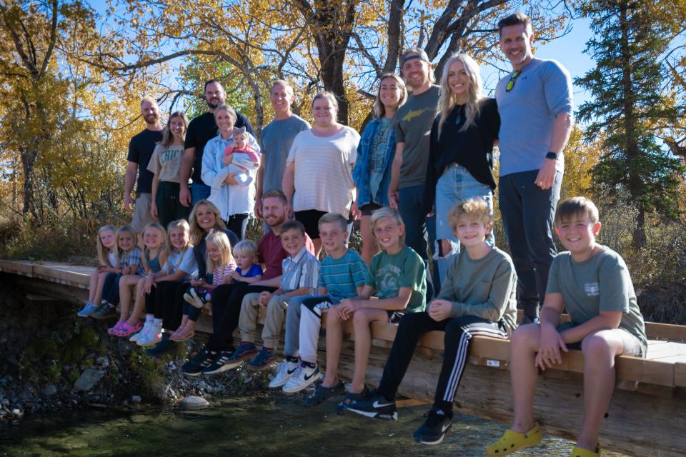 DonnaJean Wilde (bottom row, fifth from the left) with her family.