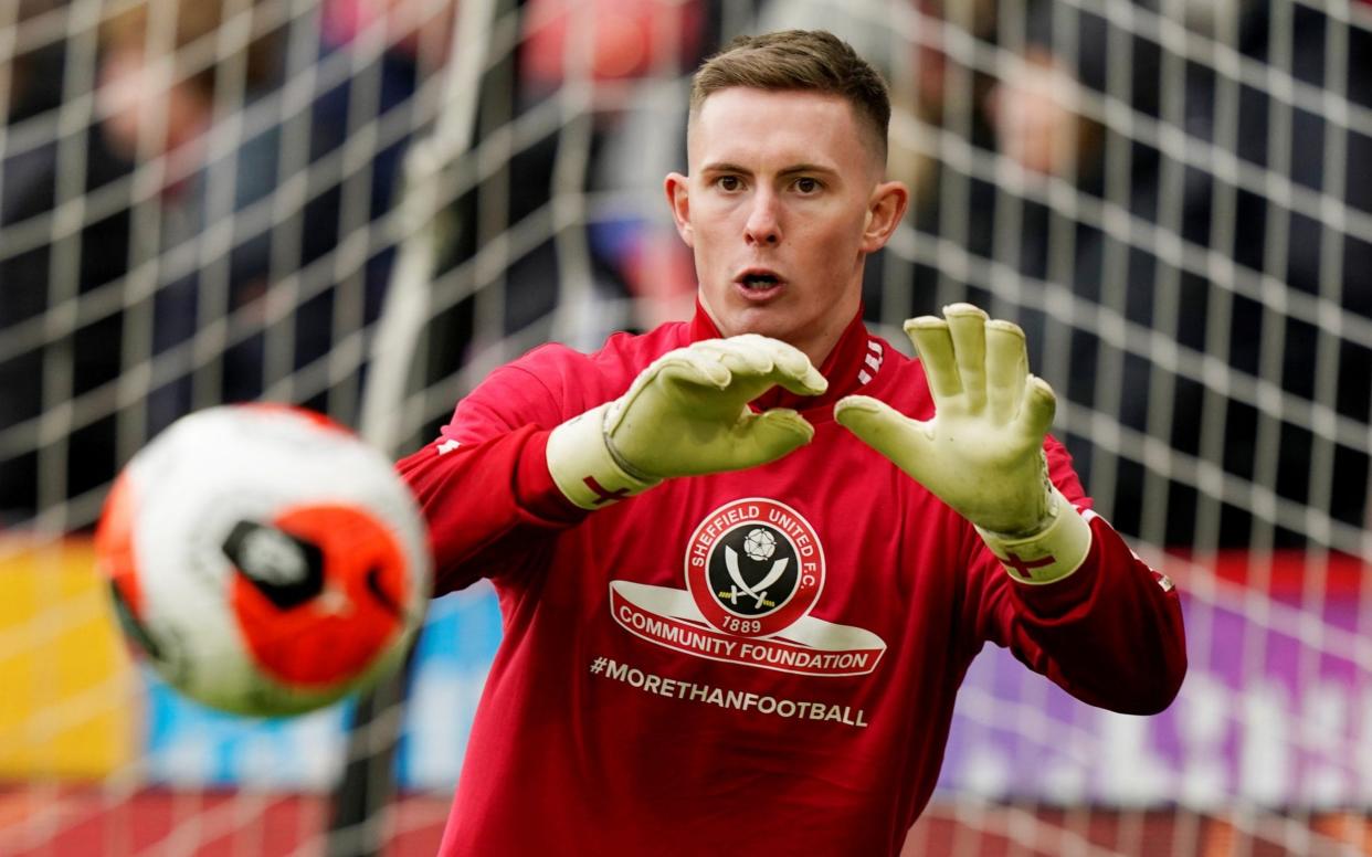 Sheffield United's Dean Henderson during the warm up before the match against Brighton - REUTERS/Andrew Yates