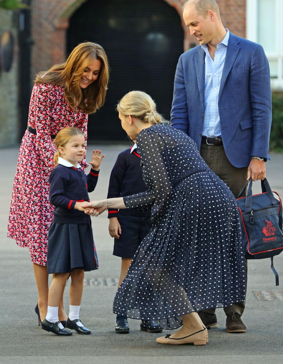 The Duke and Duchess of Cambridge's second child joined her big brother George at Thomas' Battersea in London. She was accompanied by both of her parents and George on her first day. <em>[Photo: Getty]</em>