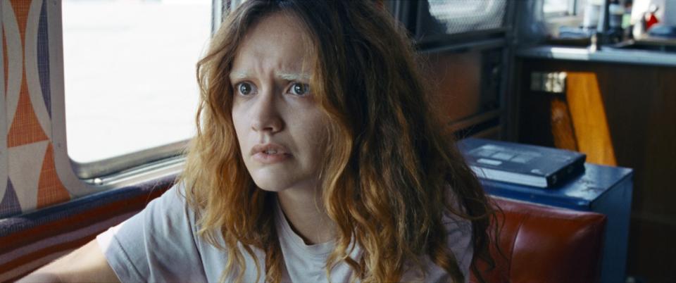 Olivia Cooke sits in RV