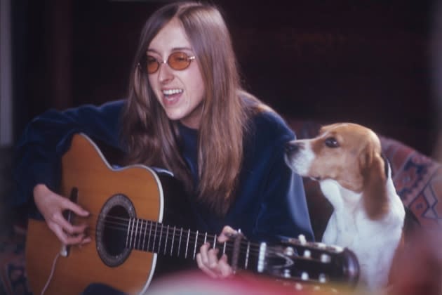 Judee-Sill-with-guitar-and-dog-Feb-5_1971-Credit_-Submarine-Entertainment - Credit: Submarine Entertainment*