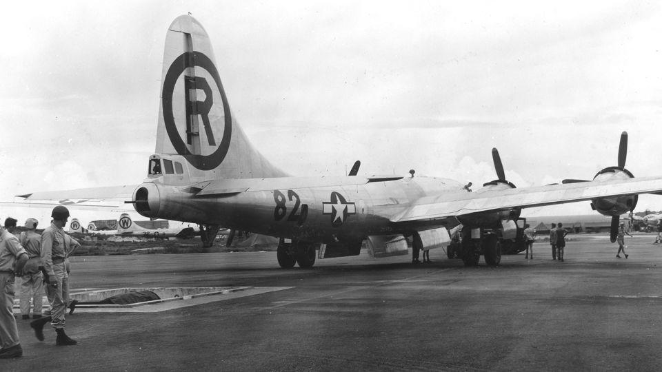 The B-29 Superfortress Enola Gay as it moved over the bomb pit on the North Field of Tinian air base, North Marianas Islands, early August, 1945. The plane was loaded with an atomic bomb, codenamed Little Boy, which it then dropped on the Japanese city of Hiroshima on August 6. - PhotoQuest/Getty Images