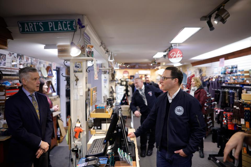 Gov. Josh Shapiro, at right, visited Art's For Him & Her, an apparel and tailoring shop in Honesdale on Feb. 16, 2024. He speaks with owner Tom Fasshauer, whose late father Art Fasshauer began the business in 1948. Shapiro also visited Gather, a boutique shop, and Runaway Train Brewery. The governor discussed local economic opportunities and Honesdale's current revitalization project supported by his proposed state budget.