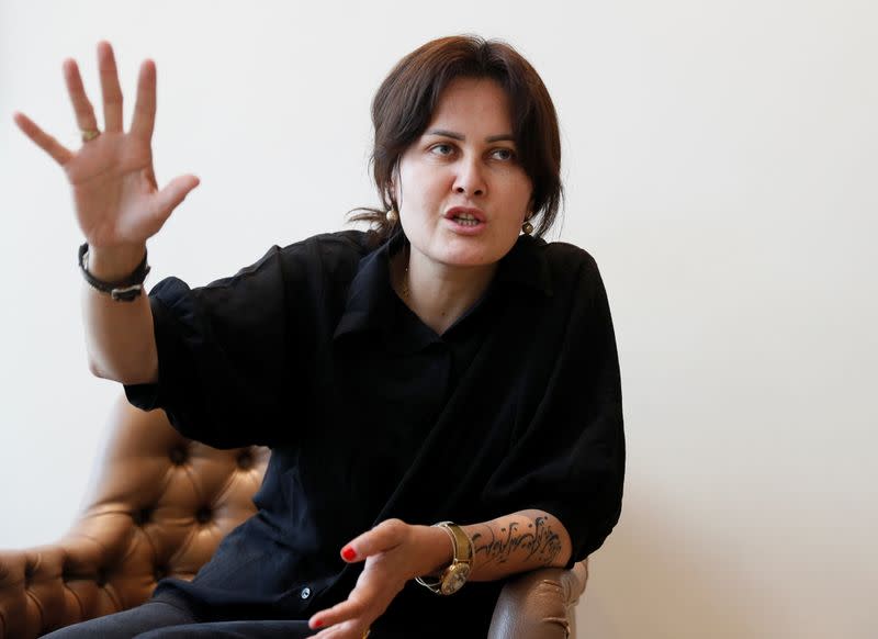 Afghan filmmaker Sahraa Karimi speaks during an interview with Reuters in Kyiv