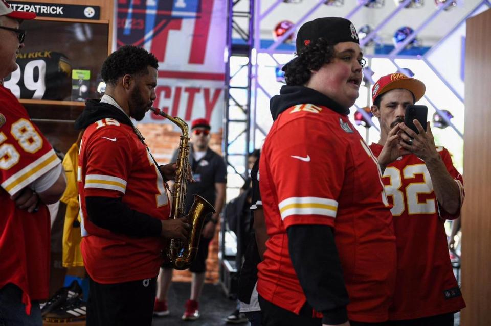 JahVelle Rhone entertained visitors with his saxophone while they lined up to purchase Patrick Mahomes jerseys at the NFL Draft Experience Thursday, April 27, 2023, at the National WWI Museum and Memorial in Kansas City.