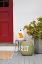 <p>As a seasonal alternative, display your house number on a pumpkin and place it outside your front door. You can even show hometown pride by painting your state on one, with a star marking your city.</p><p>Get the tutorial from <a href="https://www.countryliving.com/diy-crafts/g1350/pumpkin-decorating-1009/?slide=90" rel="nofollow noopener" target="_blank" data-ylk="slk:Country Living;elm:context_link;itc:0;sec:content-canvas" class="link "><em>Country Living</em></a>.</p>