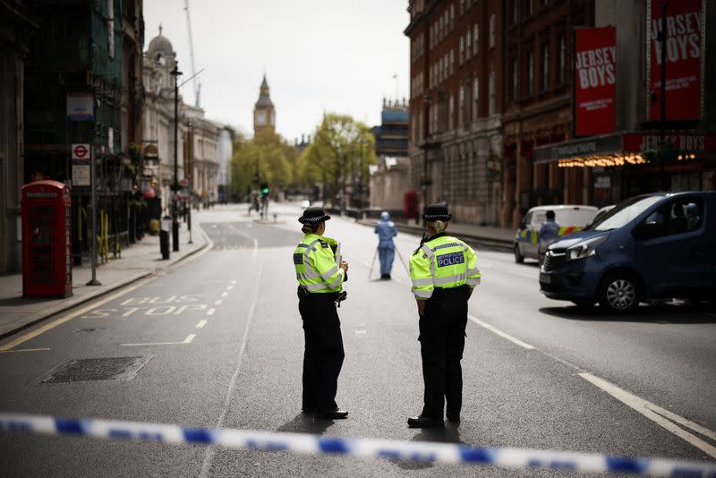 Police close road and arrest man near Downing Street following an incident, in London