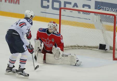 Ice Hockey - CSKA Moscow v Metallurg Magnitogorsk - Kontinental Hockey League - Gagarin Cup Grand Final, Game 7 - Moscow, Russia - 19/04/16 Metallurg Magnitogorsk's Evgeny Timkin scores a goal past CSKA Moscow's goalkeeper Ilya Sorokin. REUTERS/Maxim Shemetov