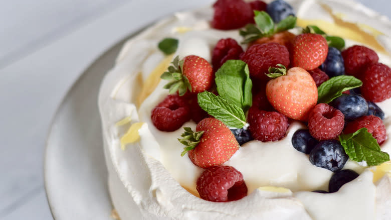 pavlova topped with berries