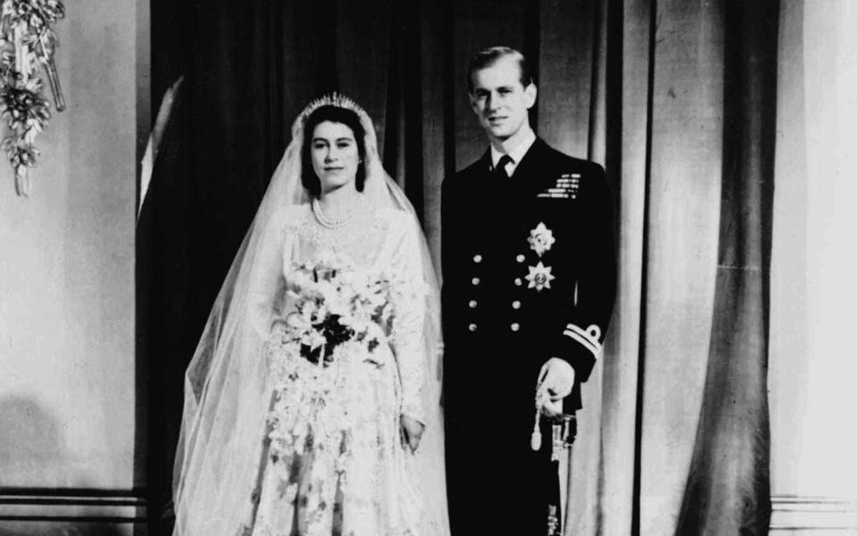 Queen Elizabeth pictured on the day of her wedding to Prince Philip in London in 1947 - AP