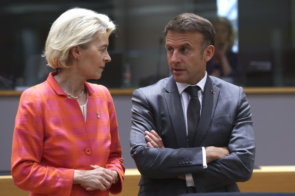 French President Emmanuel Macron, right, speaks with European Commission President Ursula von der Leyen during a round table meeting at an EU summit in Brussels, Thursday, June 27, 2024. European Union leaders are expected on Thursday to discuss the next EU top jobs, as well as the situation in the Middle East and Ukraine, security and defence and EU competitiveness. (Olivier Hoslet, Pool Photo via AP)