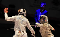 Mariel Zagunis (R) of the US fights with Italy's Gioia Marzocca during the match for Bronze of the Women's Team Sabre competition at the 2012 World Fencing Championships in Kiev on April 13, 2011. USA womens team won the Bronze medals of the championship. AFP PHOTO/ SERGEI SUPINSKY (Photo credit should read SERGEI SUPINSKY/AFP/Getty Images)