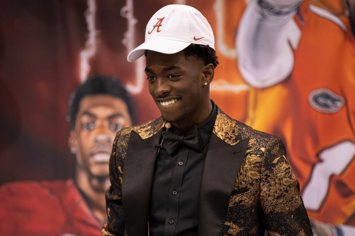 St. John Paul II Catholic High School's Terrion Arnold announces his signing with the University of Alabama in the school's gym on National Signing Day Wednesday, Feb. 3, 2021.