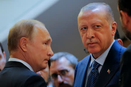 Russian President Vladimir Putin (L) meets with his Turkish counterpart Tayyip Erdogan in Sochi, Russia September 17, 2018. Alexander Zemlianichenko/Pool via REUTERS